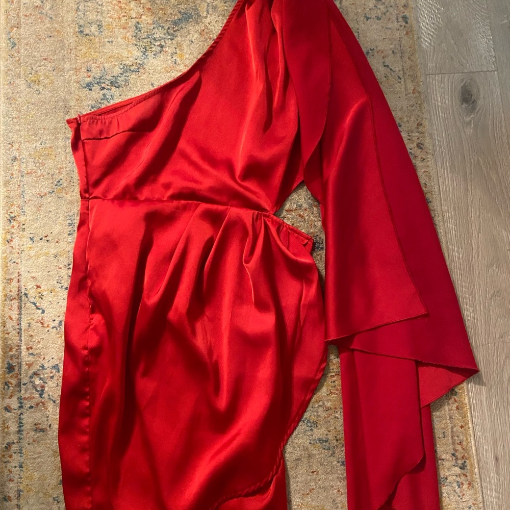 Red cocktail dress with one sided cape